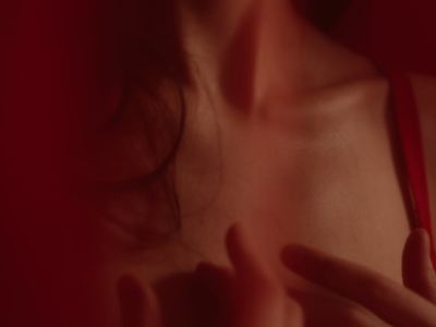 A woman's hands in a graceful gesture.